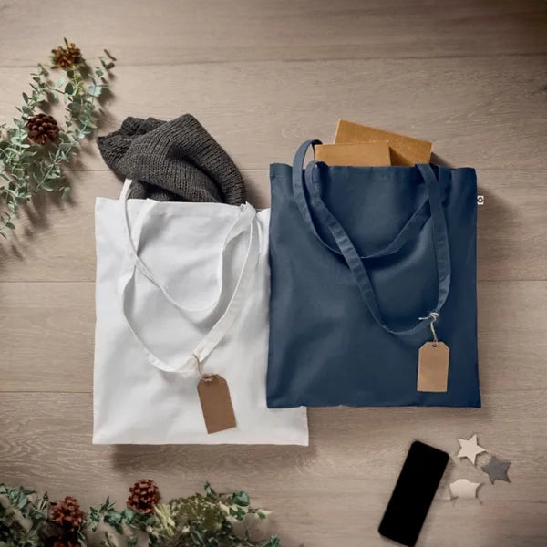 gekleurde katoenen boodschappentas lange hengsels marine blauw sfeer foto 199268