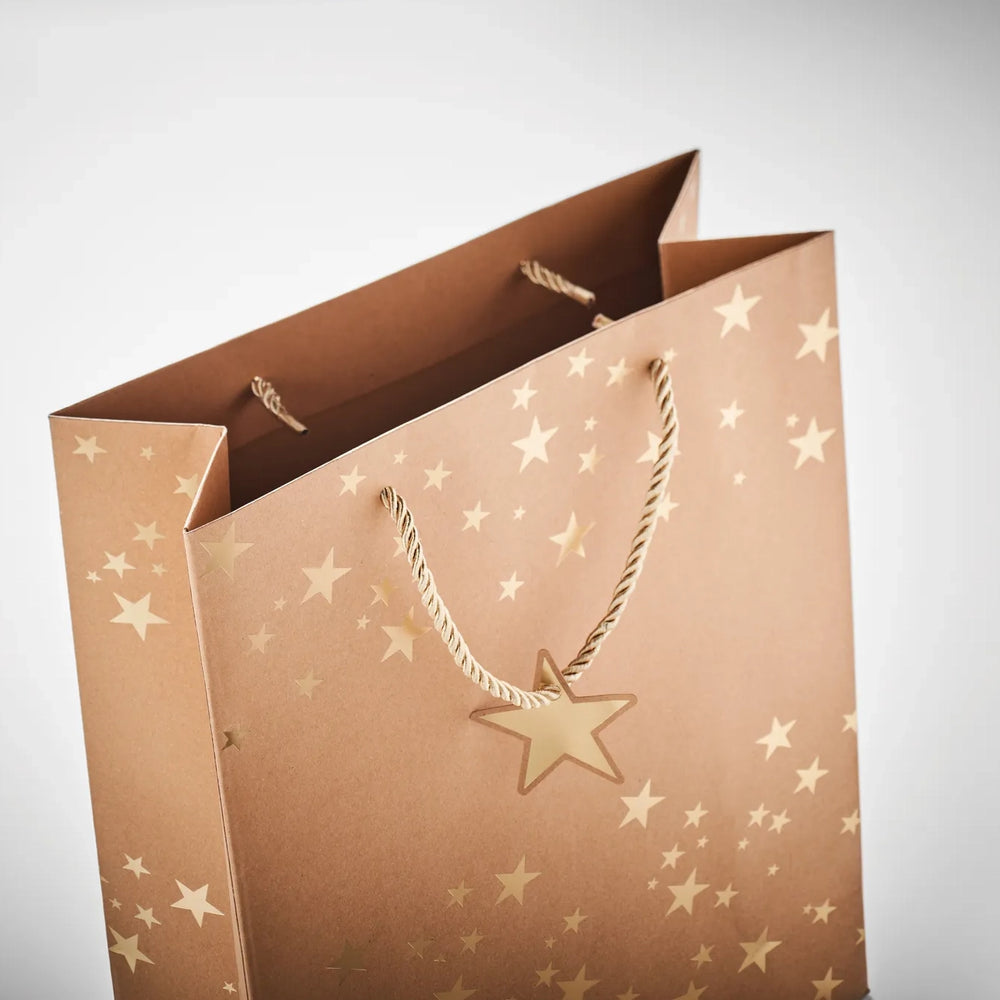Kraft geschenkzakje met feestelijk kerstpatroon