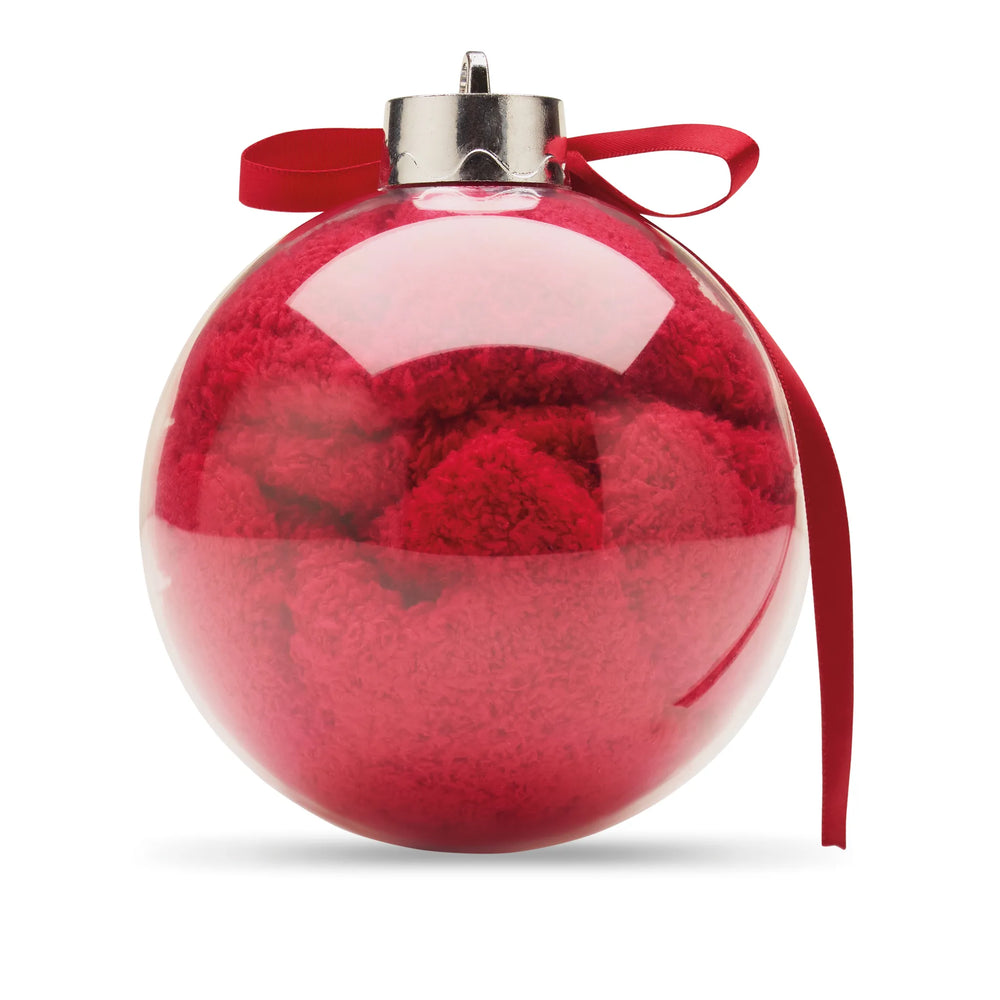 Kerstsokken in transparante kerstbal
