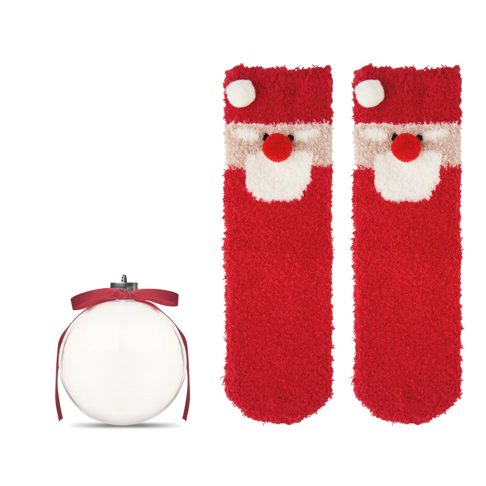 Kerstsokken in transparante kerstbal