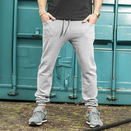 joggingbroek slim fit build your brand grijs voorzijde 24by013